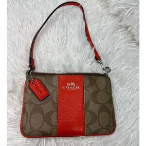 COACH Brown orange Zip Wristlet